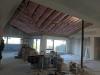 Insulation was added to the walls and ceiling of this existing home from the inside as part of an extensive retrofit to avoid replacing original 1-inch shiplapped sheathing. 