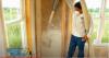 Right – Fiberglass insulation is blown in to fill wall cavities. 