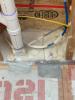 Wrong – When insulating with spray foam, care should be taken to completely fill areas around piping and other penetrations to avoid leaving air gaps. 