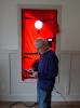 Right – The energy rater used a window to test whole-house air leakage with this blower door testing equipment. 