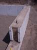 Right – Insulated concrete forms (ICFs) provide the insulated stem wall for the slab-on-grade foundation for this SIP house. 