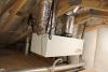 Right – The HVAC unit installed in the insulated attic uses a heat pump to provide heating and cooling while also providing dehumidification and fresh air ventilation.