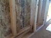 Right – This home is framed with double walls – two 2x4 walls set next to each other then sheathed with OSB on the exterior and netted on the interior face to create an extra-deep wall cavity that can be filled with blown-in insulation. 