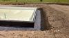 Right – A dimpled plastic rainscreen product is installed over liquid-applied waterproofing on the exterior of the ICF foundation walls, directing water down the wall to the perimeter drain tile, thus encouraging drainage around the foundation.
