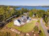 This home was designed with continuous roof vents and very few roof penetrations, allowing more room for the solar shingles that integrate with the asphalt shingles installed to meet IBHS Fortified Roof criteria for increased resistance to high winds and wind-driven rain. 