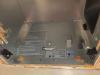 The fan was removed from this exhaust fan box to access and air seal the seams with metal tape and the holes in the housing with canned spray foam