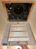 After air-sealing the exhaust fan box, re-install the fan, and lights if needed, and re-attach the cover