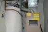Wrong – Two combustion appliances are sharing a flue which could lead to backdrafting if one appliance is updated to a direct vent appliance and disconnected from shared chimney. 