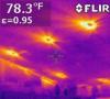 The yellow areas in this infrared camera image show where heat from the attic is entering the home around recessed can light fixtures 