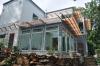 Permanent awnings help minimize unwanted solar heat gain from high overhead summer sun.  
