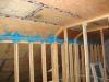 The seams in the plywood are taped seams in the cathedral ceiling serve as part of the advanced home sealing strategy.