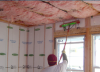 The batt insulation shown here was properly installed to fill the ceiling cavities.
