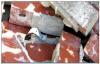 Wrong – This metal tie remained embedded in the mortar joint but the smooth-shank nail pulled out from the stud. 