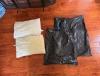 Two pillows and two garbage bags are used to make a chimney air sealing pillow