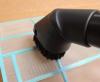 Vacuum is used to clean a reusable air filter for a ductless heat pump