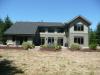 Clifton View Homes built this system home in the marine climate in Whidbey Island, WA, and certified it to DOE Zero Energy Ready Home specifications in 2013. 
