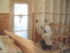 Right - Closed-cell spray foam is installed as a skim coat to provide air tightness to an exterior wall cavity before installing batt or blown cavity insulation.