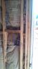 Wrong - Craft faced batt insulation is not cut to fit around wiring and eletrical boxes and is squished into corners forming voids which could encourage cold spots in wall.