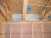 Insert rigid blocking pieces into each joist bay and fasten with caulk or nails