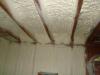 Right - A “flash” seal approach with spray foam provides a continuous air barrier between the ceiling and walls of the garage and the living space.