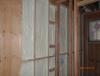 Right – Closed-cell spray foam insulation in the shared wall between the garage and living space helps to air-seal the wall and protect  occupants from garage pollutants.