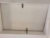 Latches were added to this attic access panel to hold it more tightly against the weatherstripping for better air sealing when closed.
