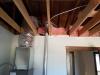 Wrong - HVAC duct and flue are too close to wall and will be difficult to properly air seal and insulate around when ceiling is installed.