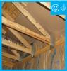 Right - Continuous wall sheathing and blocking has been installed to brace the raised heel trusses.