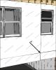 House wrap is sealed at all seams and overlaps flashing to serve as a continuous drainage plane over the exterior walls.