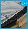 Right – The water-resistant barrier is layered over the step flashing to provide a complete drainage system