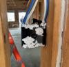 Right - Electrical boxes and wood-to-wood joints in exterior or garage-to-house walls have been caulked