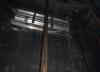 An elevator shaft vent with a motorized damper in a multistory multifamily building provides smoke and hot gas control in an elevator shaft during fire events; during normal operation the damper remains closed to reduce energy loss.
