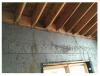 Right - every rafter is secured to the wall framing with metal ties.