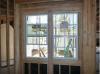 This wall and window assembly has excessive framing around the windows, which can lead to heat gain in how climate zones. 