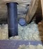 This exhaust fan duct opens into the attic rather than exiting through the roof and mold has begun to form on the underside of the deck sheathing and on the rafter due to the moist air exiting the duct
