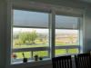 External solar screens are an effective way to reduce solar heat gains through windows while maintaining view.