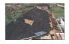 Failure of composition roof shingles and underlayment due to high winds.