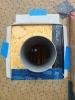 Right - Flaps are cut into house wrap installed over an HRV duct then taped out of the way to install flashing; 8 of 14.