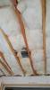 Wrong - Batt insulation is poorly installed leaving gaps along the ceiling.