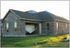 Wrong – Garage door failure due to positive pressures from hurricane force winds. 