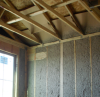 Baffles allow ventilation under roof decking while keeping wind from blowing insulation back from the edges of an attic.