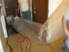 The duct sealing spray injection system application tunnel inflates as the injection system operates