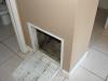 Wrong: Open wall cavities in the un-air-sealed return plenum connect the plenum to attic spaces