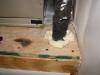 Right: Refrigerant piping is sealed where it exits the return plenum