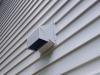 Right – The termination of this kitchen exhaust duct is sealed to the wall to keep out air and water and is screened to keep out pests.