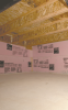 Right - This unvented crawlspace is insulated along interior walls with rigid foam and air-sealed by covering the floor with vapor retarder that is sealed to the rigid foam which is taped at the seams. 