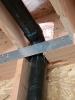 Wrong - Hole in rim joist was cut too large for plumbing pipe and the gaps are not air sealed.