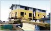 This home was elevated above the Design Flood Elevation and the pre-existing first story became the second story. 