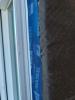 Wrong - House wrap and flashing tape are poorly installed allowing water to get into the gaps behind flashing tape.