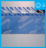 Right – two-thirds of the blue butyl flashing tape is above the sheathing seam; the top edge of the butyl flashing tape is covered with clear sheathing tape that is also offset so two-thirds is above the top edge of the butyl flashing.